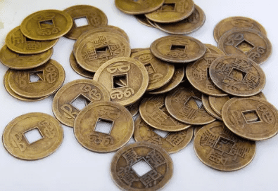古代的铜钱是谁发明的，为何是外圆内方的造型呢